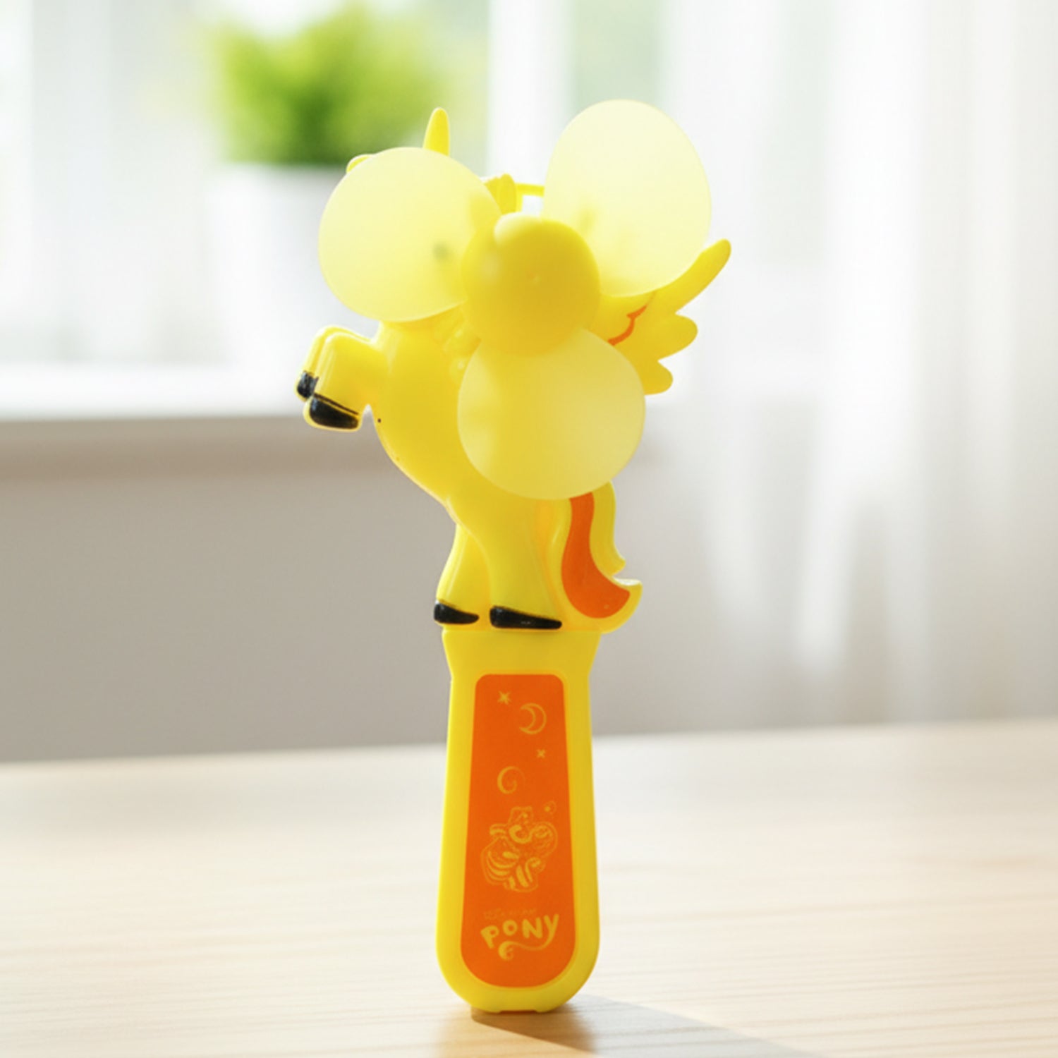 Portable Wukusy Hand Press Mini Cartoon Fan toy in mixed colors, compact and fun for kids and fans.
