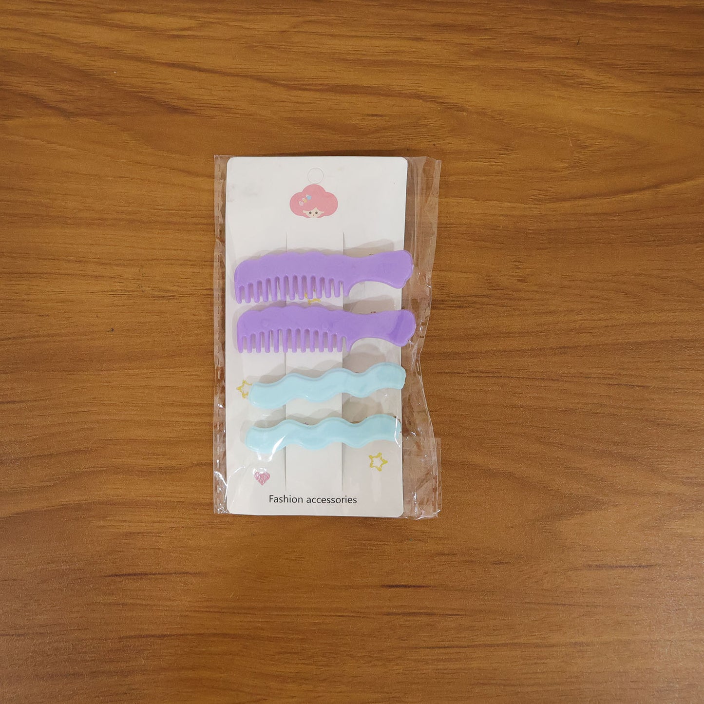 Set of four stylish Wukusy comb-shaped hair clips for girls and women, featuring decorative hair pins for everyday wear.