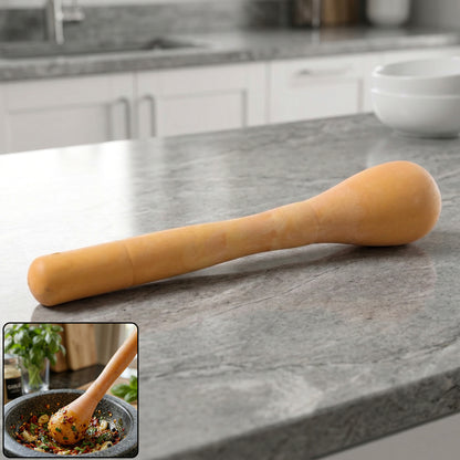 Wukusy manual masher grinder tool for kitchen use, showing a compact, handheld kitchen gadget with a textured mashing surface.