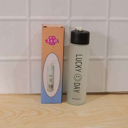 Wukusy premium frosted glass water bottle with leak-proof lid, 350 ml, showcasing sleek design and clear glass with lid.