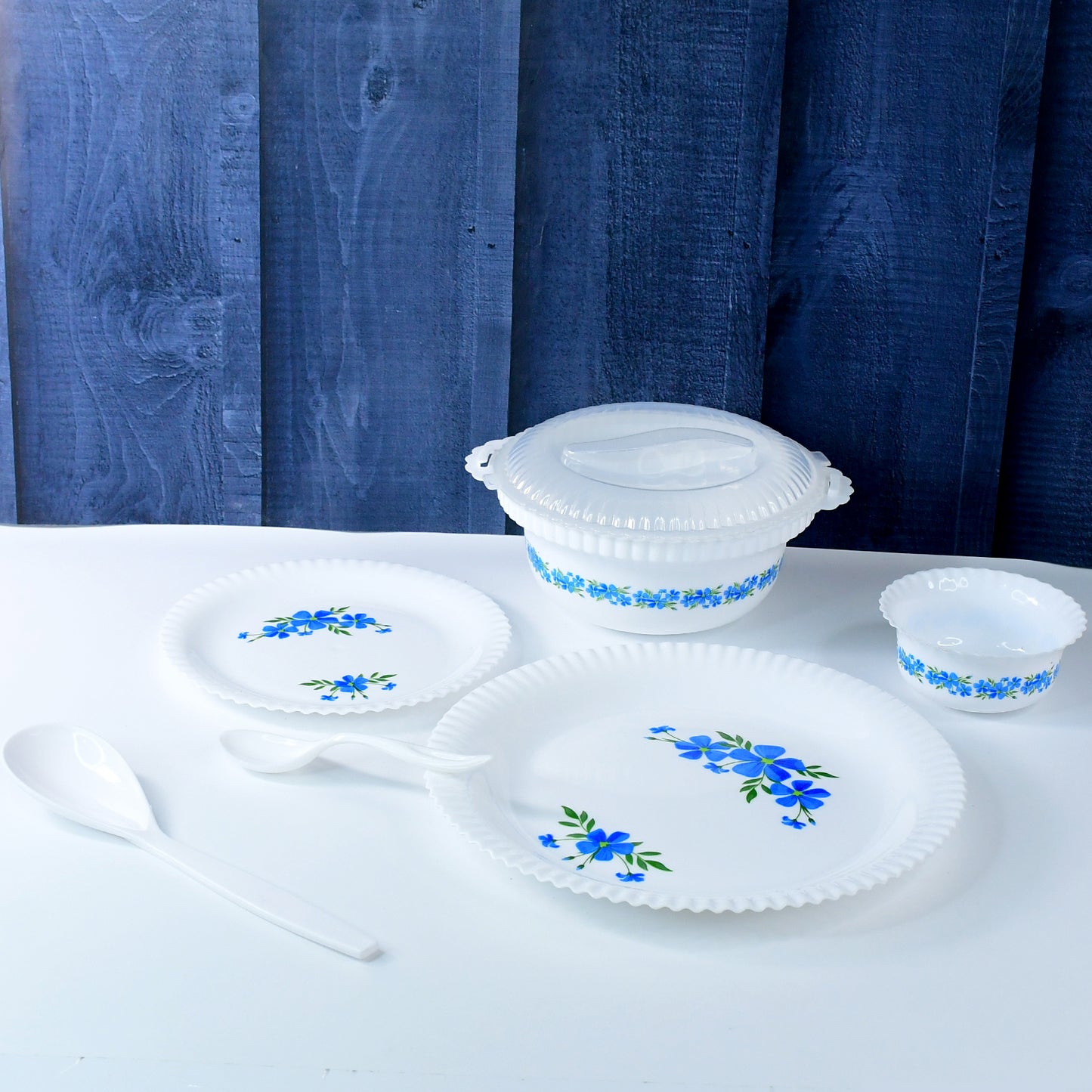 Wukusy 36-piece premium dinner set with plates, bowls, and cups arranged on a table for a stylish meal setting