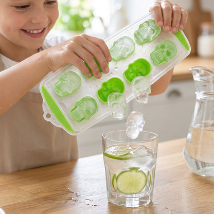Plastic 8-grid skull-shaped ice cube tray with lid by Wukusy, showing the mold filled with clear water for freezer ice cubes.