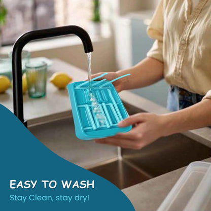 Wukusy baby feeding bottle drying rack with multiple slots for bottles, nipples, and accessories, made of durable plastic.
