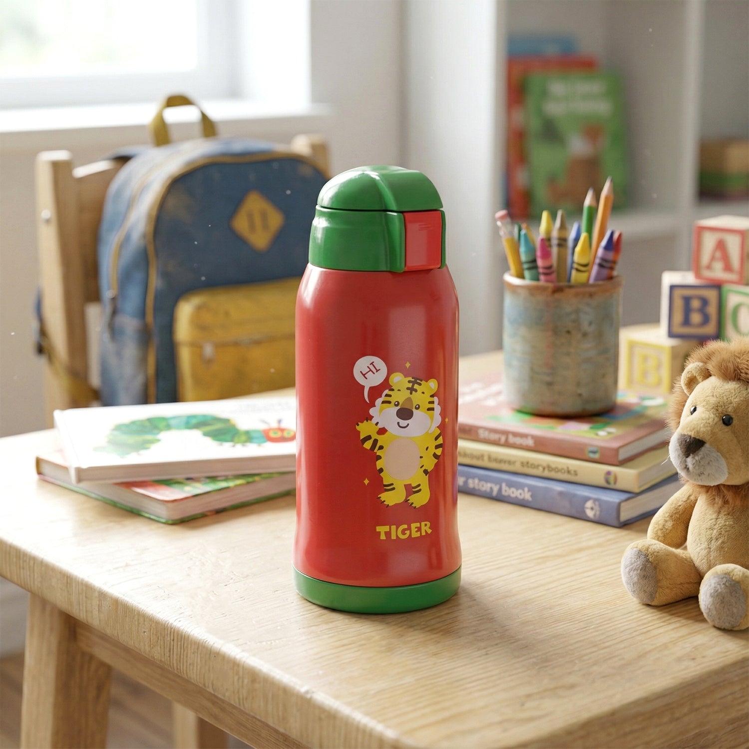 Kids cartoon printed water bottle from Wukusy, 550 ml with straw and carry sling bag, designed for children.