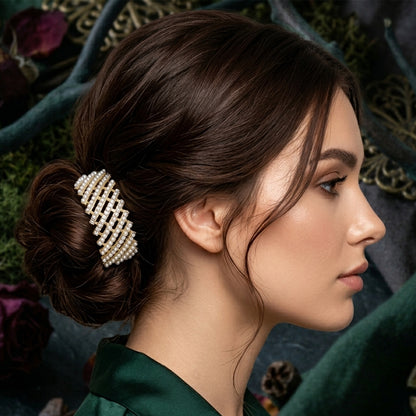 Wukusy premium metal hair claw clip with pearl-studded design, showcasing a sleek and elegant hair accessory.