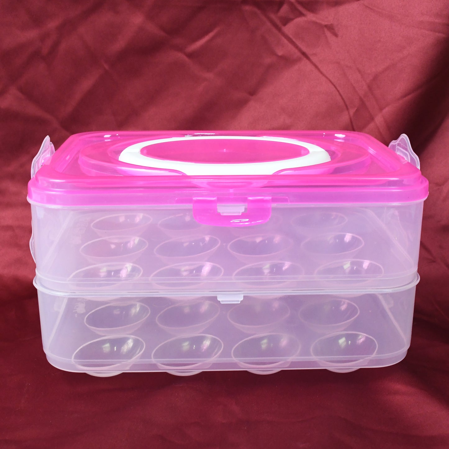 Wukusy double layer 24-grid egg storage box, kitchen tool for organizing eggs in a clear plastic container with multiple compartments.