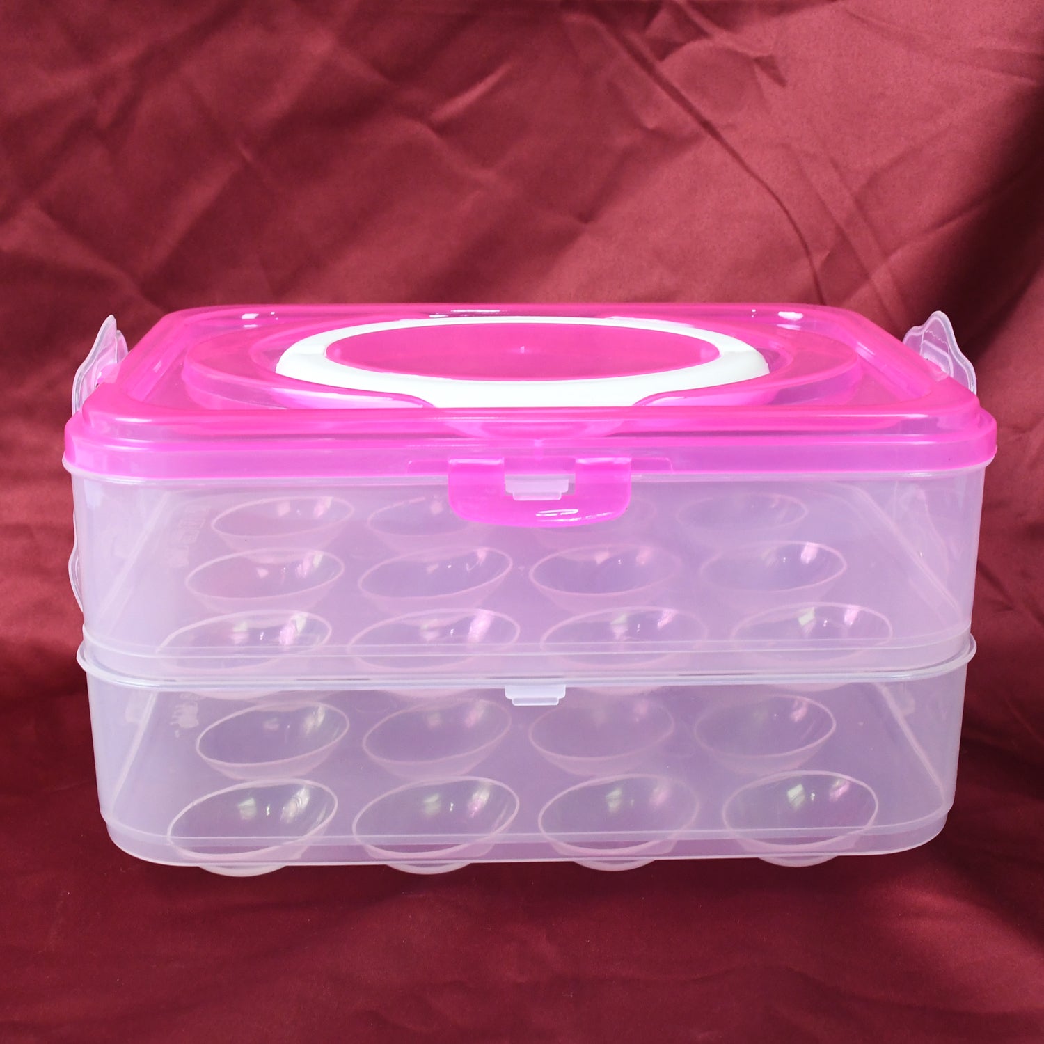 Wukusy double layer 24-grid egg storage box, kitchen tool for organizing eggs in a clear plastic container with multiple compartments.
