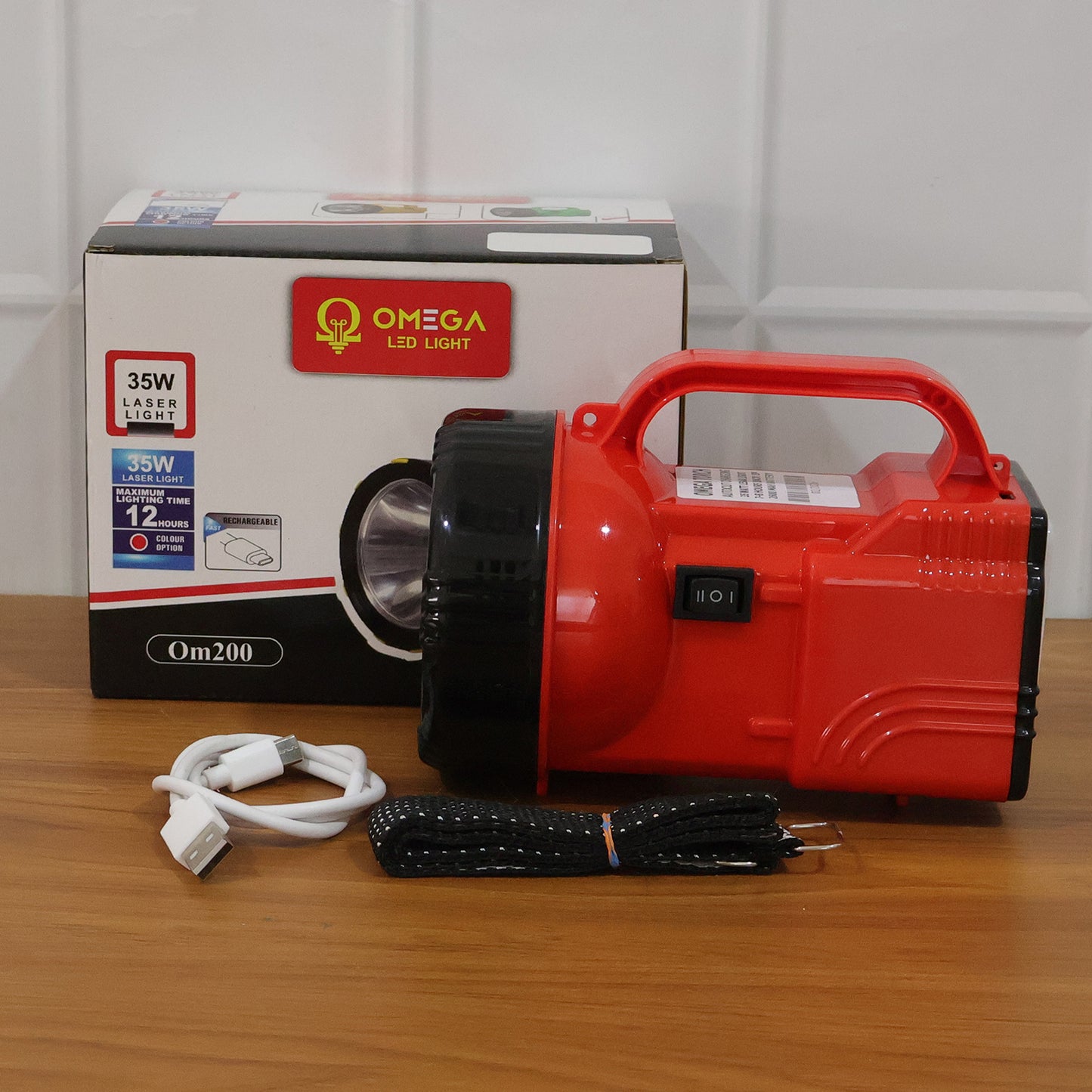 Wukusy Omega 35w high power rechargeable LED emergency laser light, showing its compact design and bright beam in use.