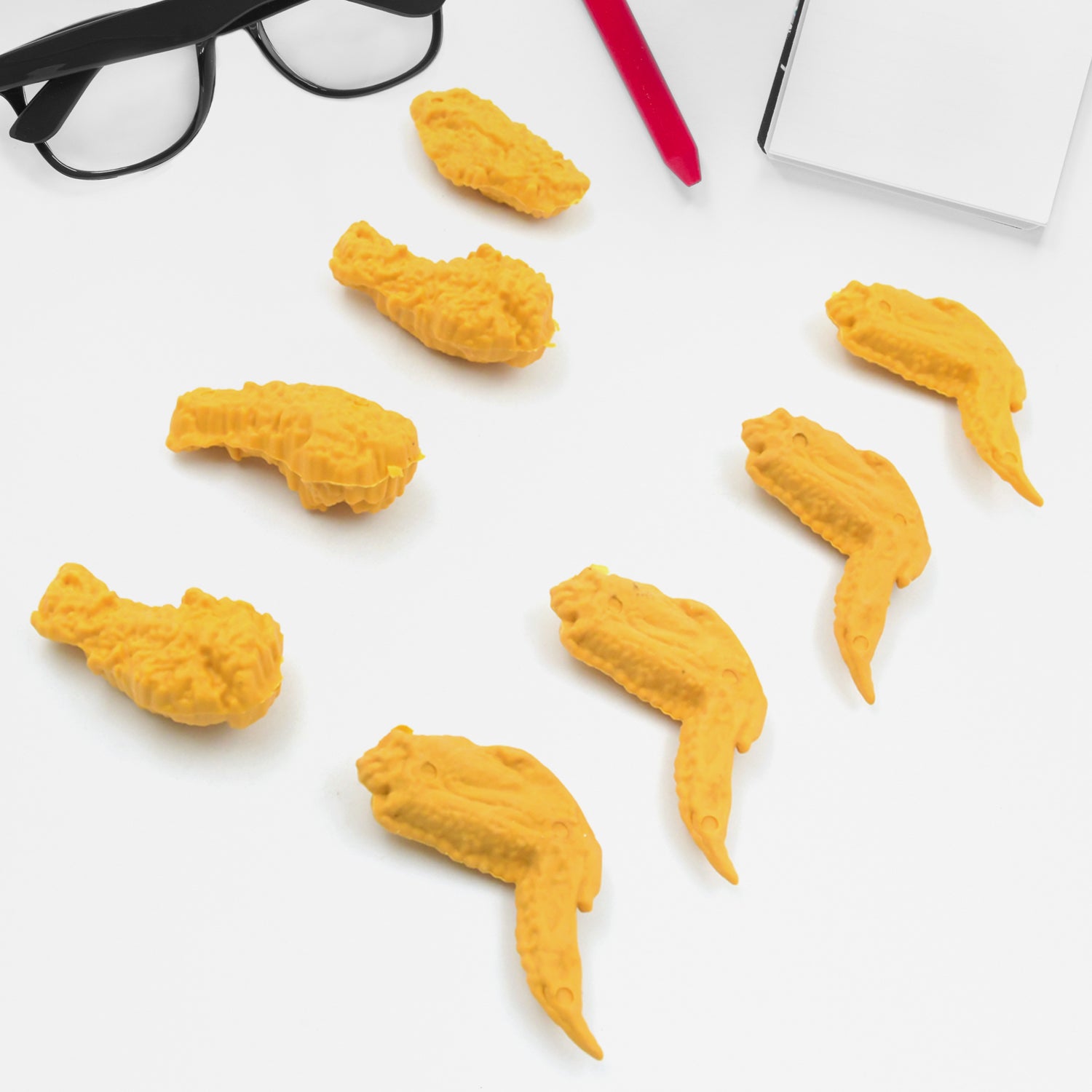 Set of 8 Wukusy cute chicken wing and chicken leg rubber erasers for school supplies, office, or fun gift for kids and students.