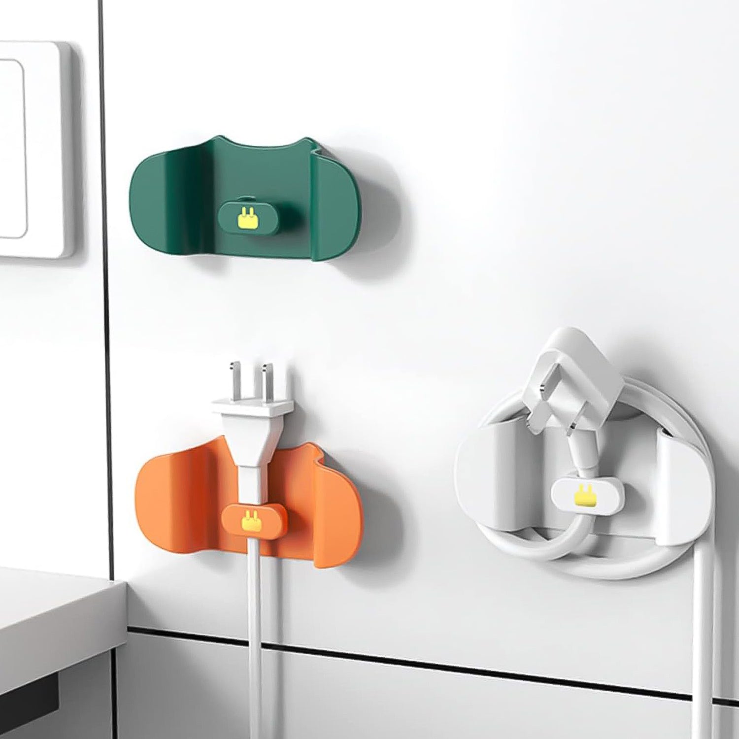 Wall mounted Wukusy plug holder hook for home improvement, showing the sturdy hook and mounting hardware.