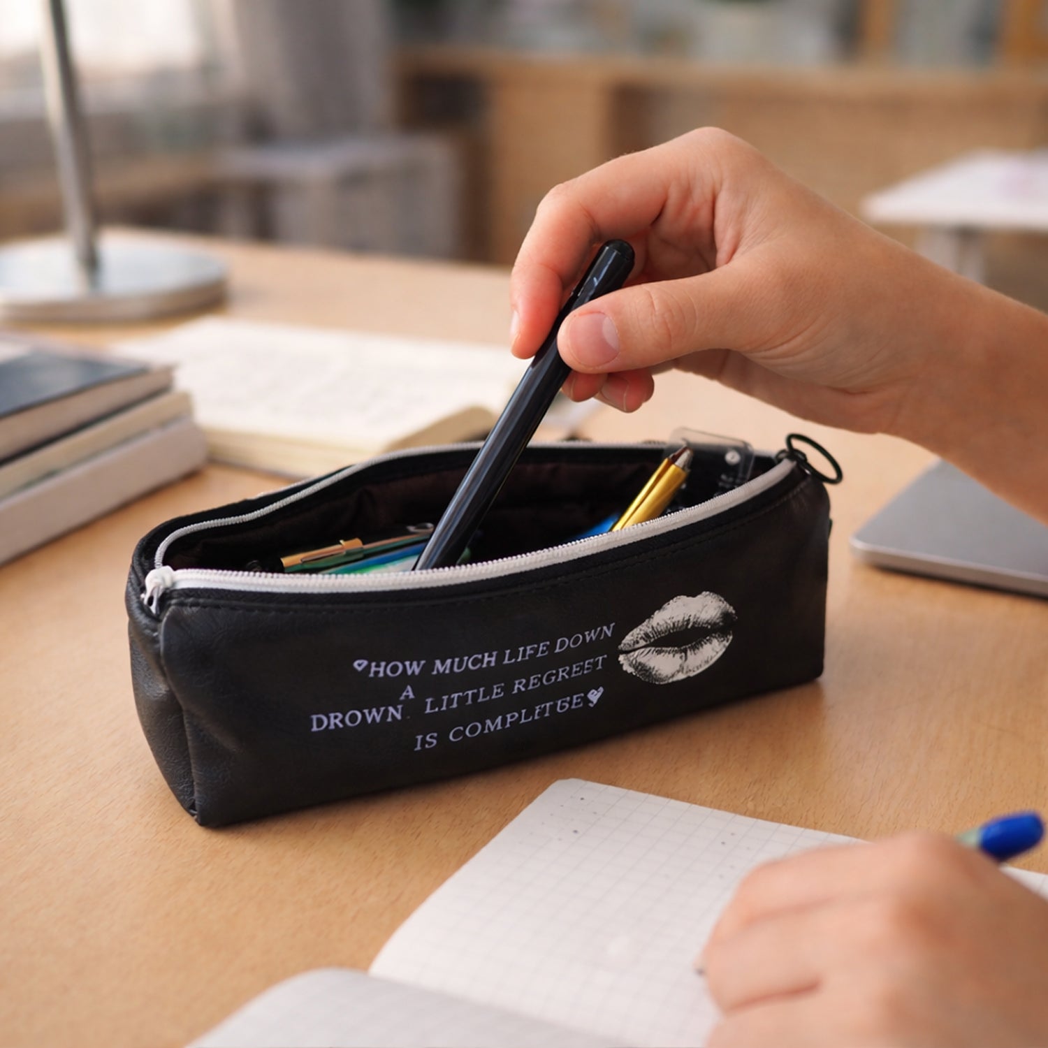 Wukusy printed zipper pencil pouch organizer with colorful design and multiple compartments for stationery storage.