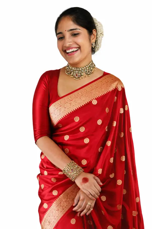 Elegant women’s silk saree from Ekom Royal Red Banarasi Elegance Collection with intricate gold zari work.