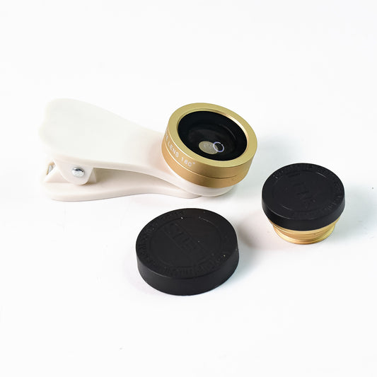 Wukusy universal clip-on mobile camera lens kit with multiple lenses attached to a smartphone for enhanced photography.
