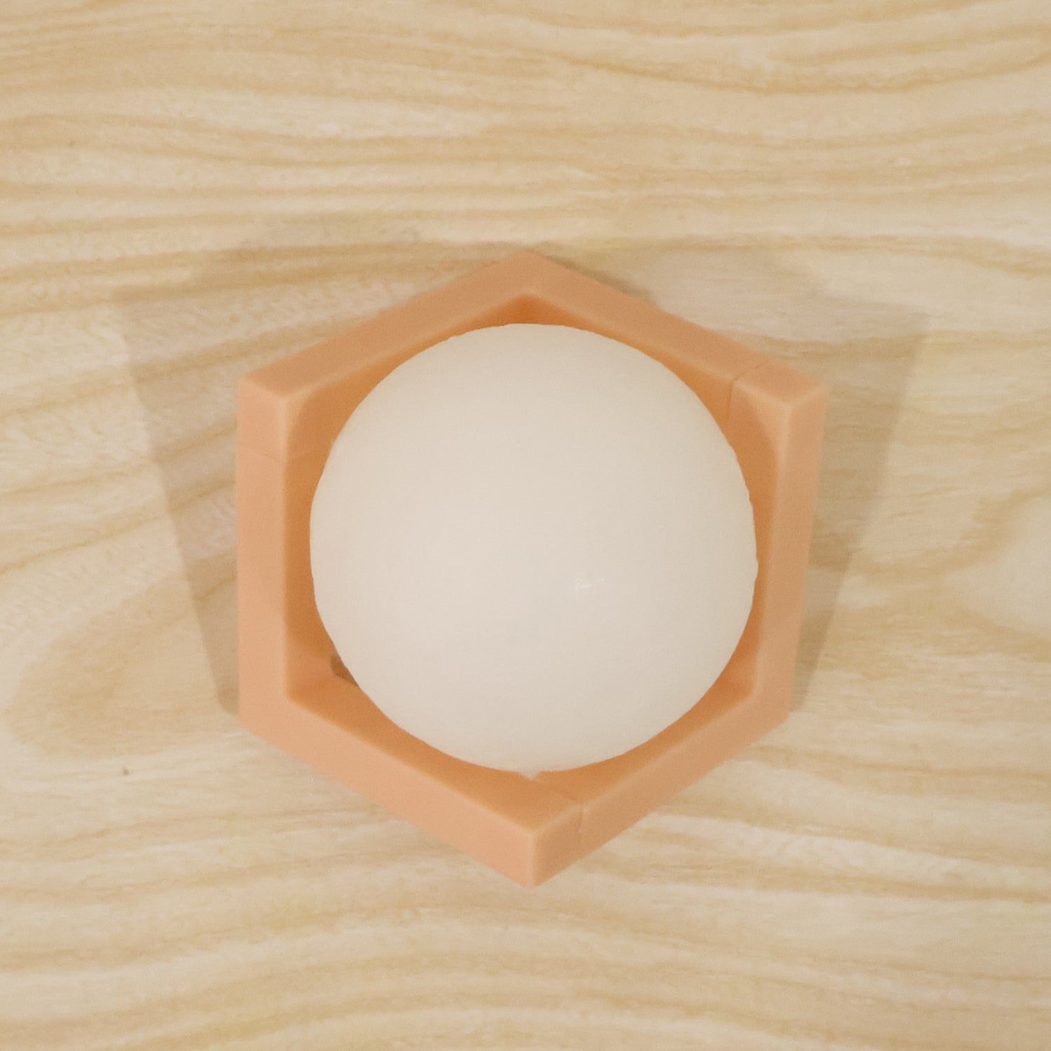 Wukusy LED ball night lamp with wooden stand, glowing softly, ideal for cozy bedroom or living room decor.