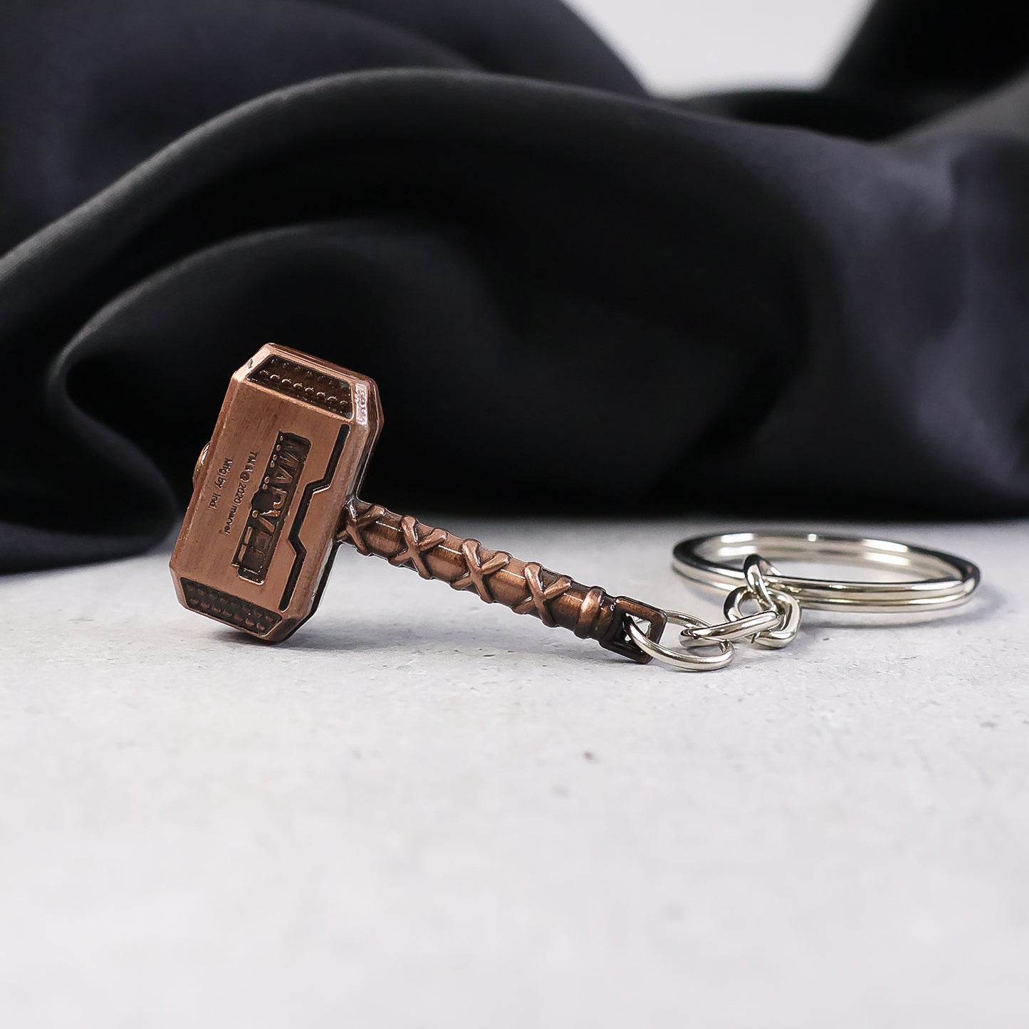 Wukusy metal hammer-shaped keychain accessory with a detailed hammer design on a keyring.