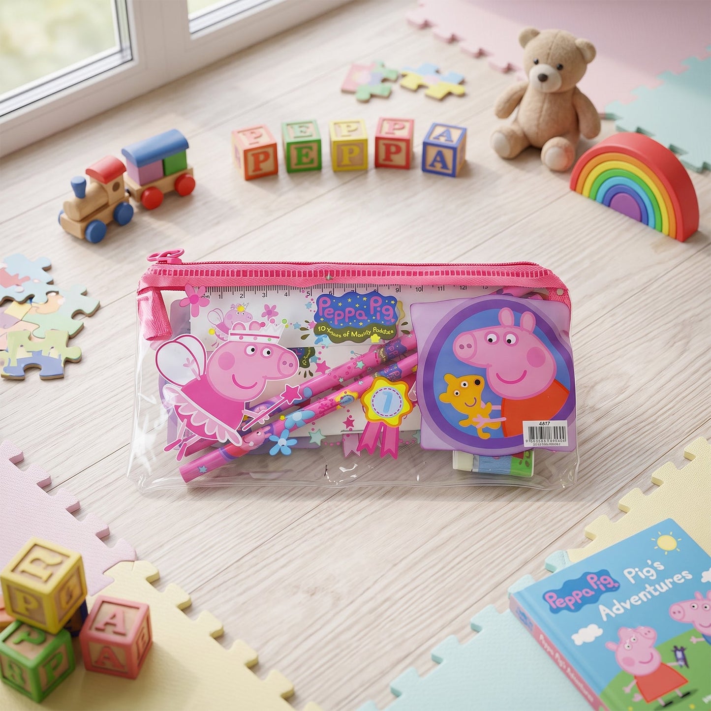 Wukusy kids school stationery kit with pencils, eraser, sharpener, ruler, and pouch, arranged on a table.