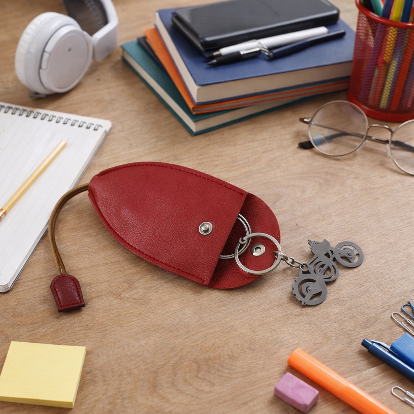 Wukusy stylish compact keyholder pouch with keyring and zipper closure, black leather accessory for organizing keys.