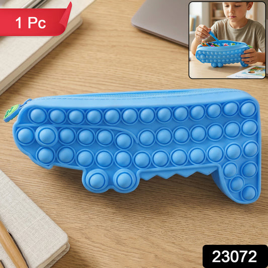 Wukusy cartoon crocodile-shaped Pop It pencil pouch with vibrant colors and fun design for school supplies.