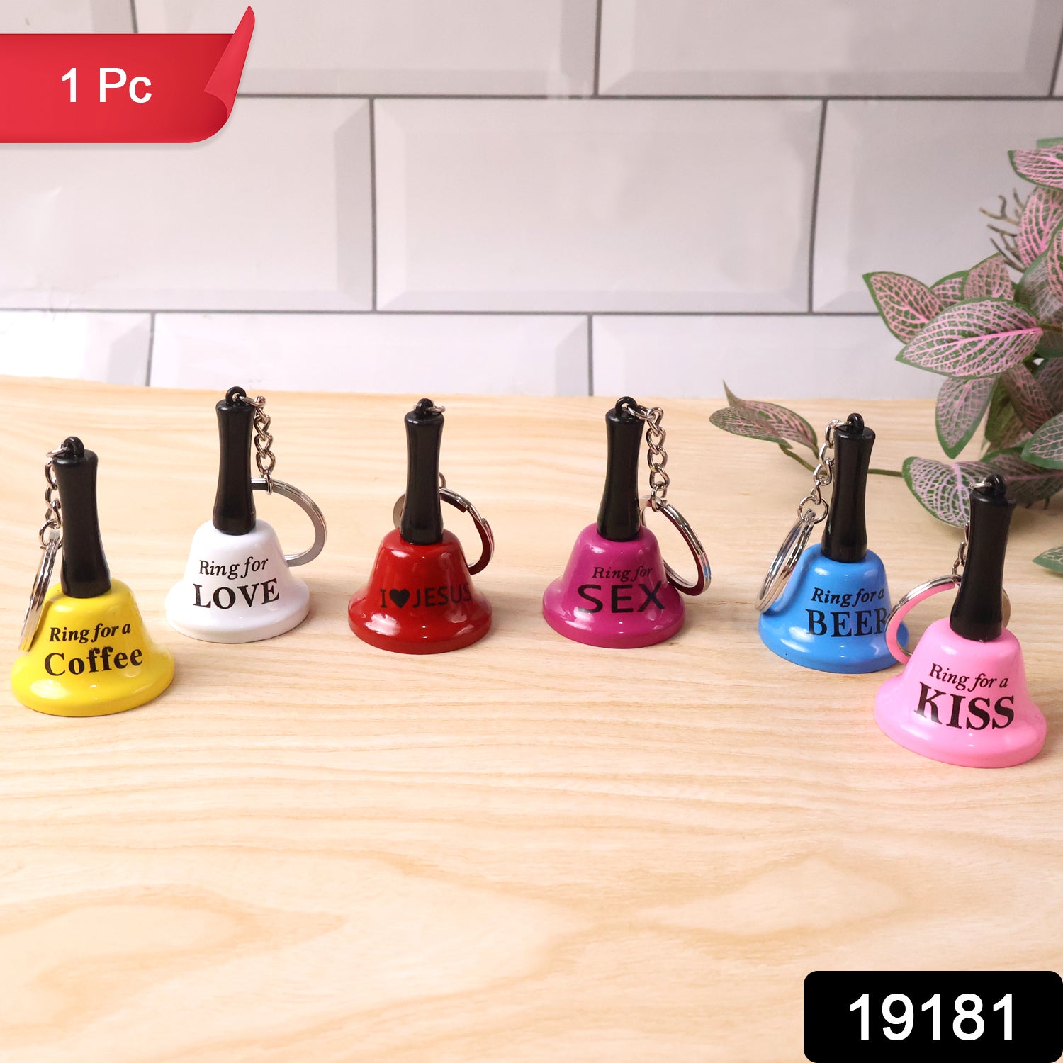 Wukusy mini hand bell with keychain, small metal bell attached to a keyring for easy carrying and alerting.