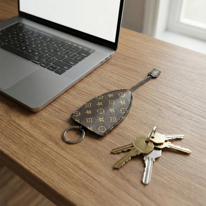 Wukusy premium designer-style keyholder key case with multiple compartments, black leather exterior and sleek design.