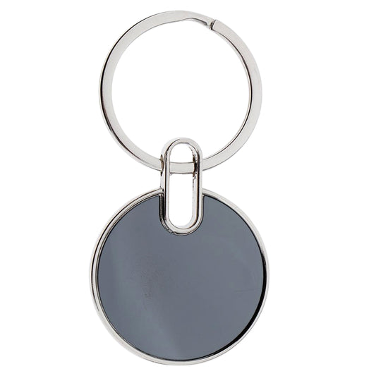Black round metal keychain by Wukusy featuring a sleek, minimalist design with a smooth finish and sturdy keyring.