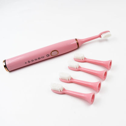 Adult waterproof electric toothbrush by Wukusy with four replacement heads, USB charging, in mixed colors.