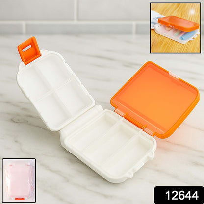 Portable orange dual-sided pill organizer box by Wukusy, with separate compartments for easy medication storage and travel.