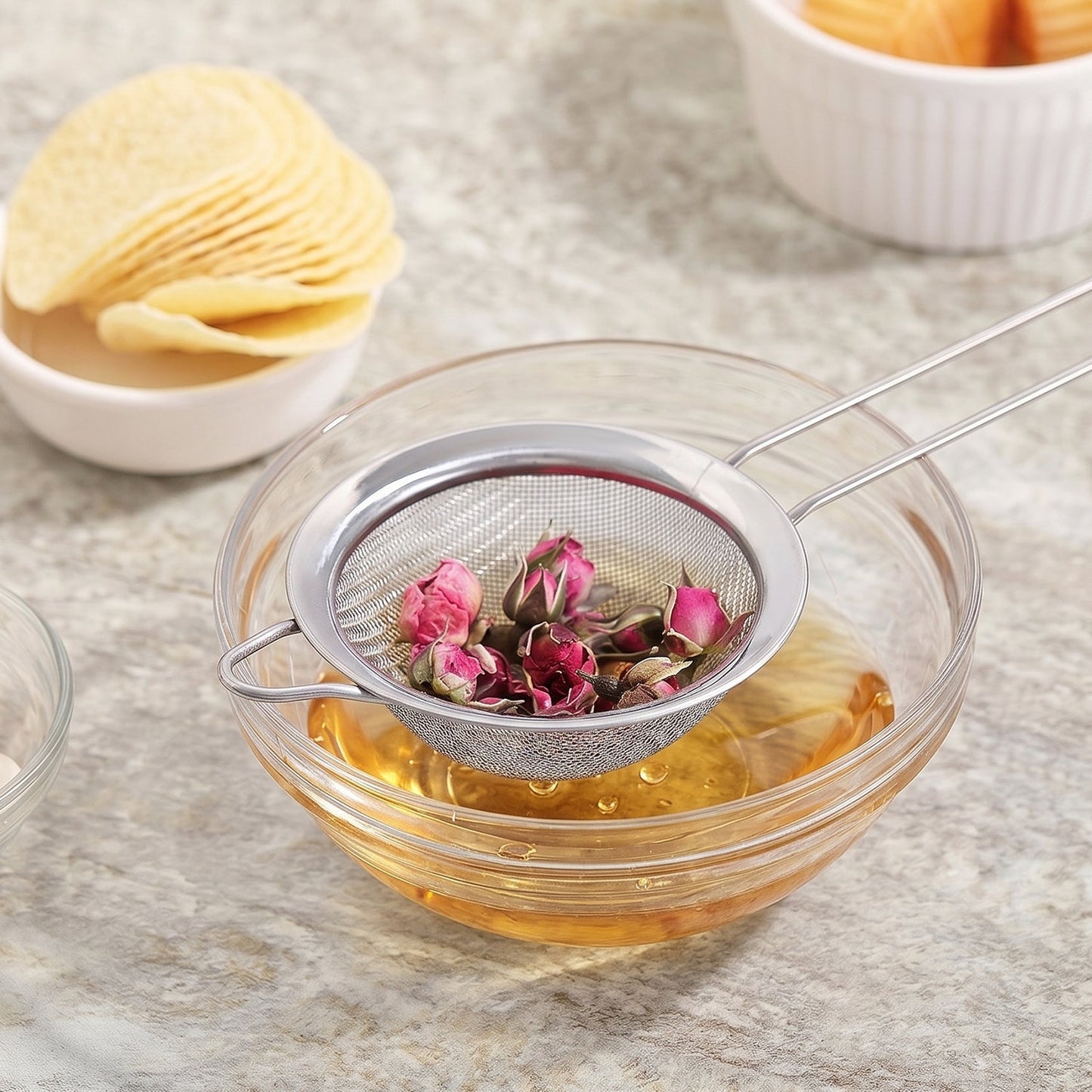 Stainless steel tea strainer with fine mesh and long handle for kitchen use, designed by Wukusy for efficient tea filtering.