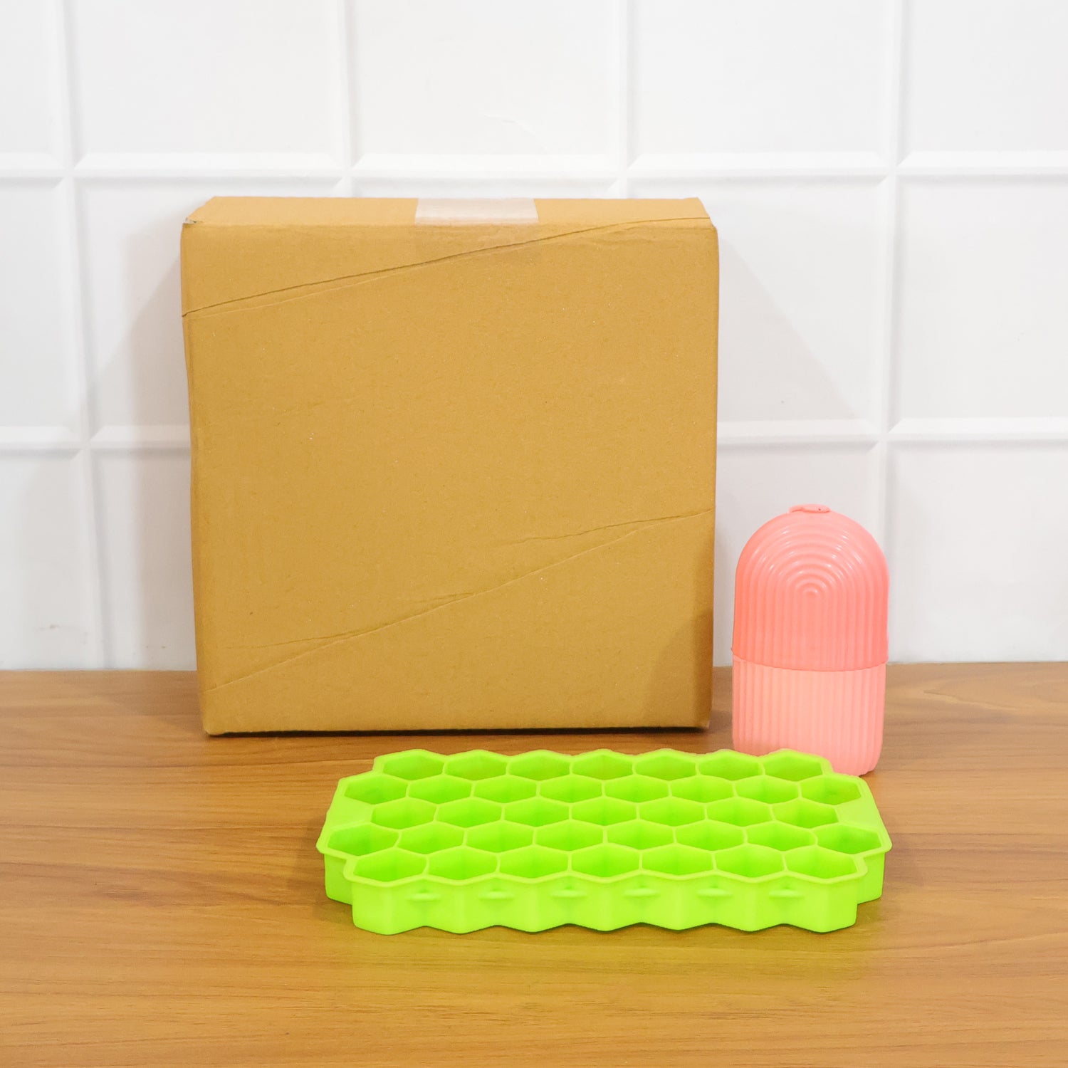 Wukusy Face Ice Roller with honeycomb ice tray, 2-piece set for soothing skincare and facial massage, shown on a clean surface.