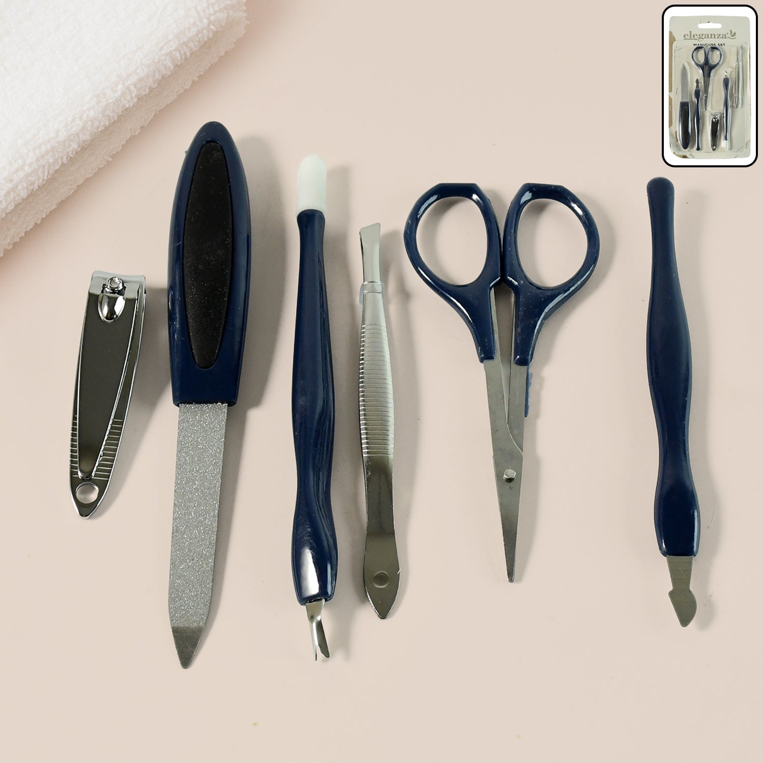 Wukusy 6-in-1 manicure and pedicure grooming kit with various nail and foot care tools, displayed on a clean surface.