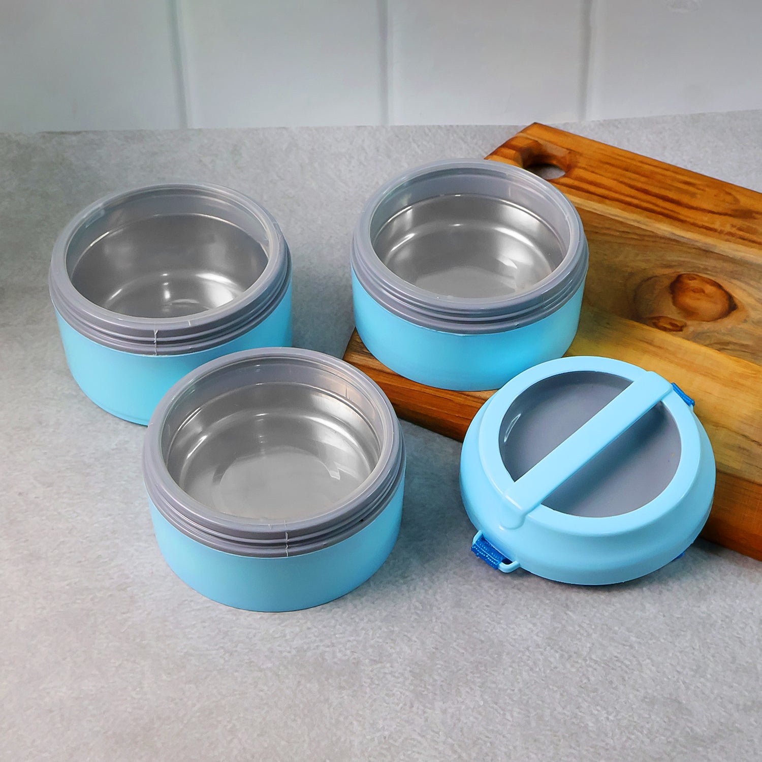 Wukusy 3-layer insulated lunch box set with handle strap, featuring multiple compartments and a sleek design for portable meal storage.