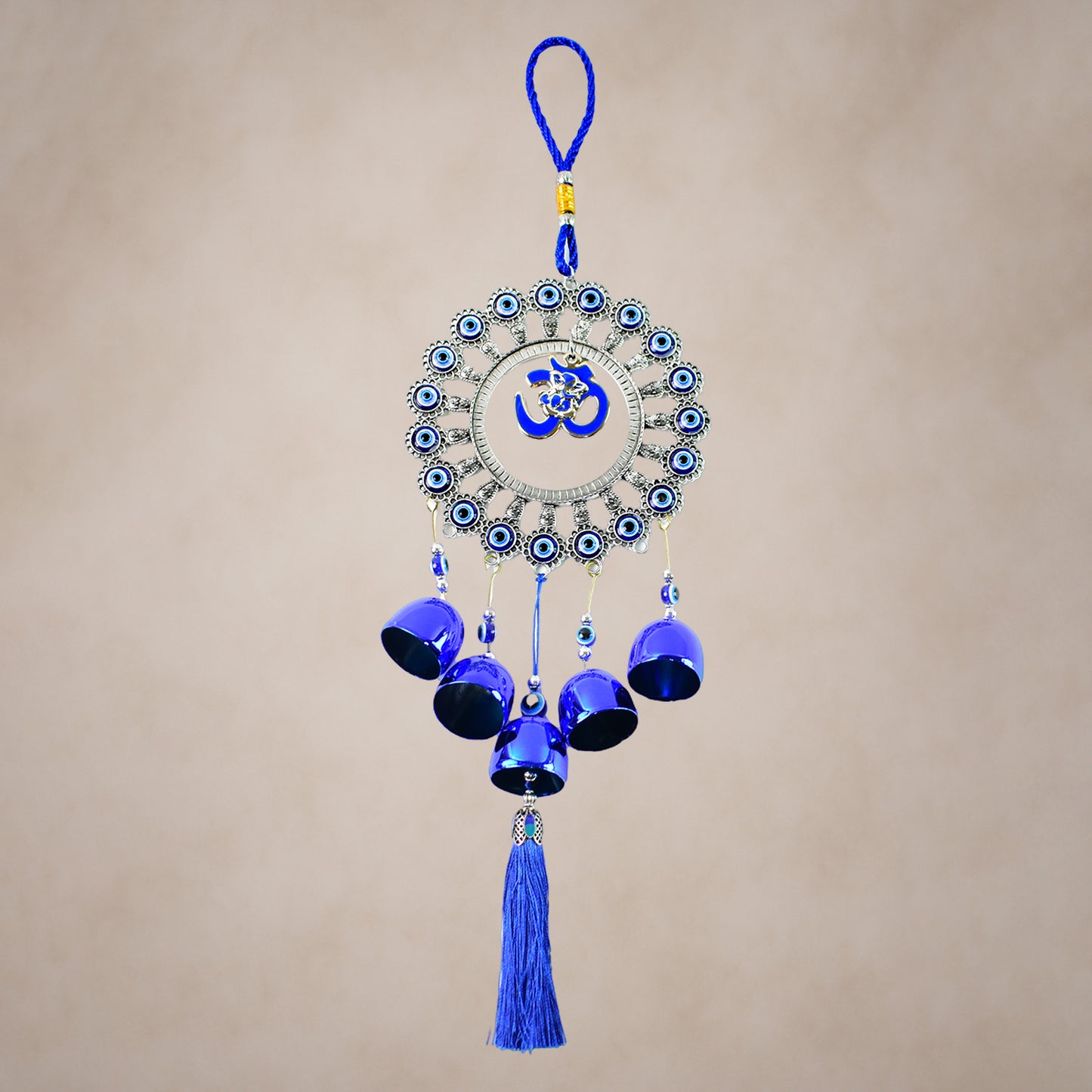 Decorative Om Evil Eye wind chime wall hanging by Wukusy featuring a vibrant blue evil eye charm and intricate design.