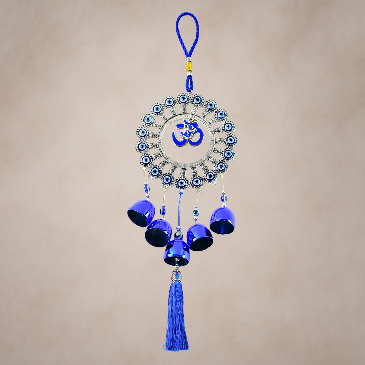 Decorative Om Evil Eye wind chime wall hanging by Wukusy featuring a vibrant blue evil eye charm and intricate design.