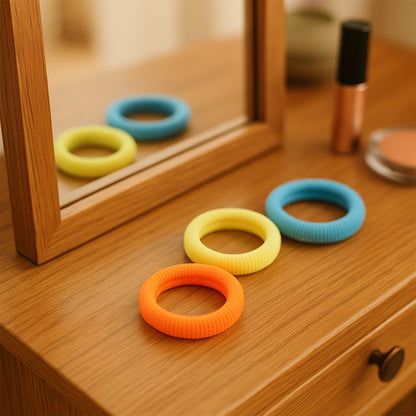Set of three Wukusy seamless soft hair elastics, gentle and stretchable hair ties for secure hold and comfortable wear.