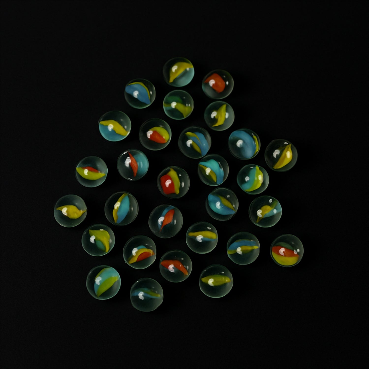 Set of 35 colorful glass marbles for kids, ideal for home decor and craft projects, by Wukusy.