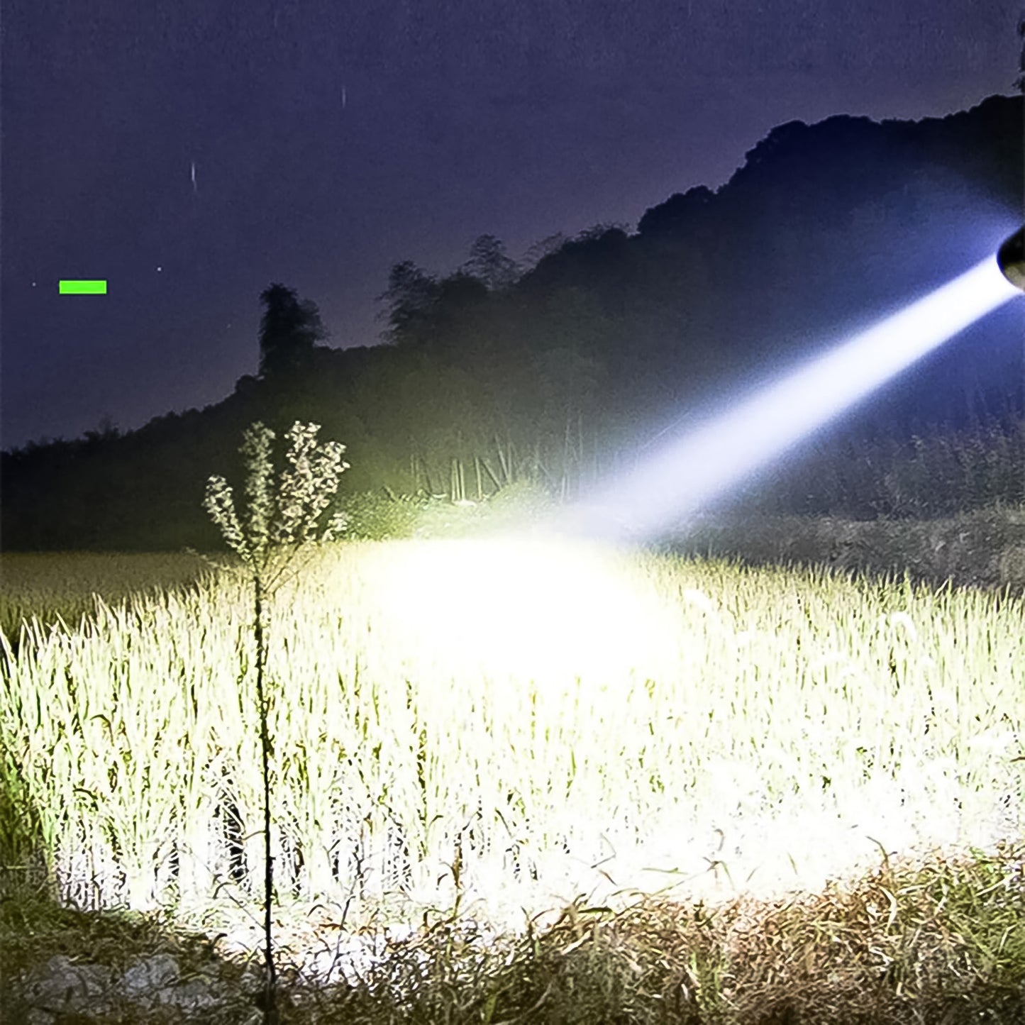 Wukusy USB chargeable mini 3 LED flashlight torch light showing compact design and LED bulbs, ideal for portable illumination.