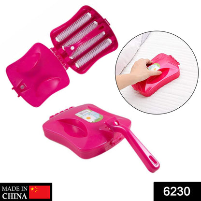 Wukusy 6230 plastic handheld carpet roller brush with dust crumb collector for wet and dry cleaning, shown in use.