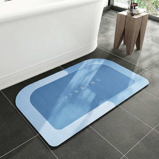 Wukusy super absorbent bathroom floor mat in 120x74 cm size, soft and plush, drying water from bathroom floors.