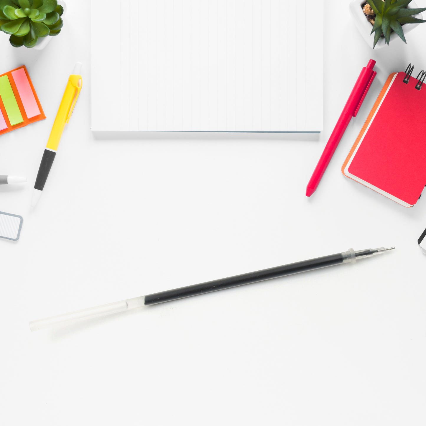 Black Wukusy ball pen refill for smooth writing, suitable for all-round office pens, shown in a close-up image.