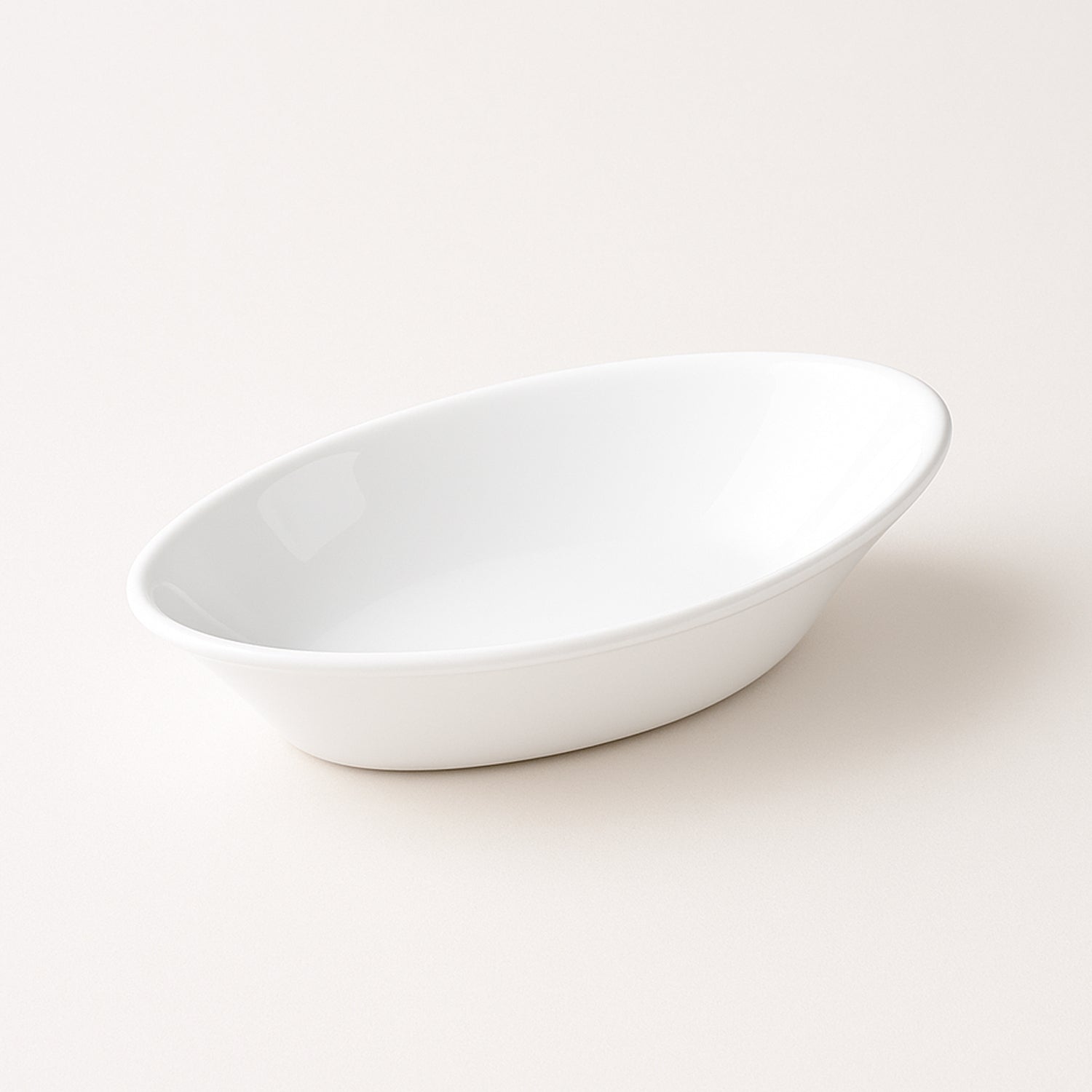 White plastic Marin serving bowl by Wukusy, elegant oval deep bowl for salads or dishes, with a smooth, glossy finish.