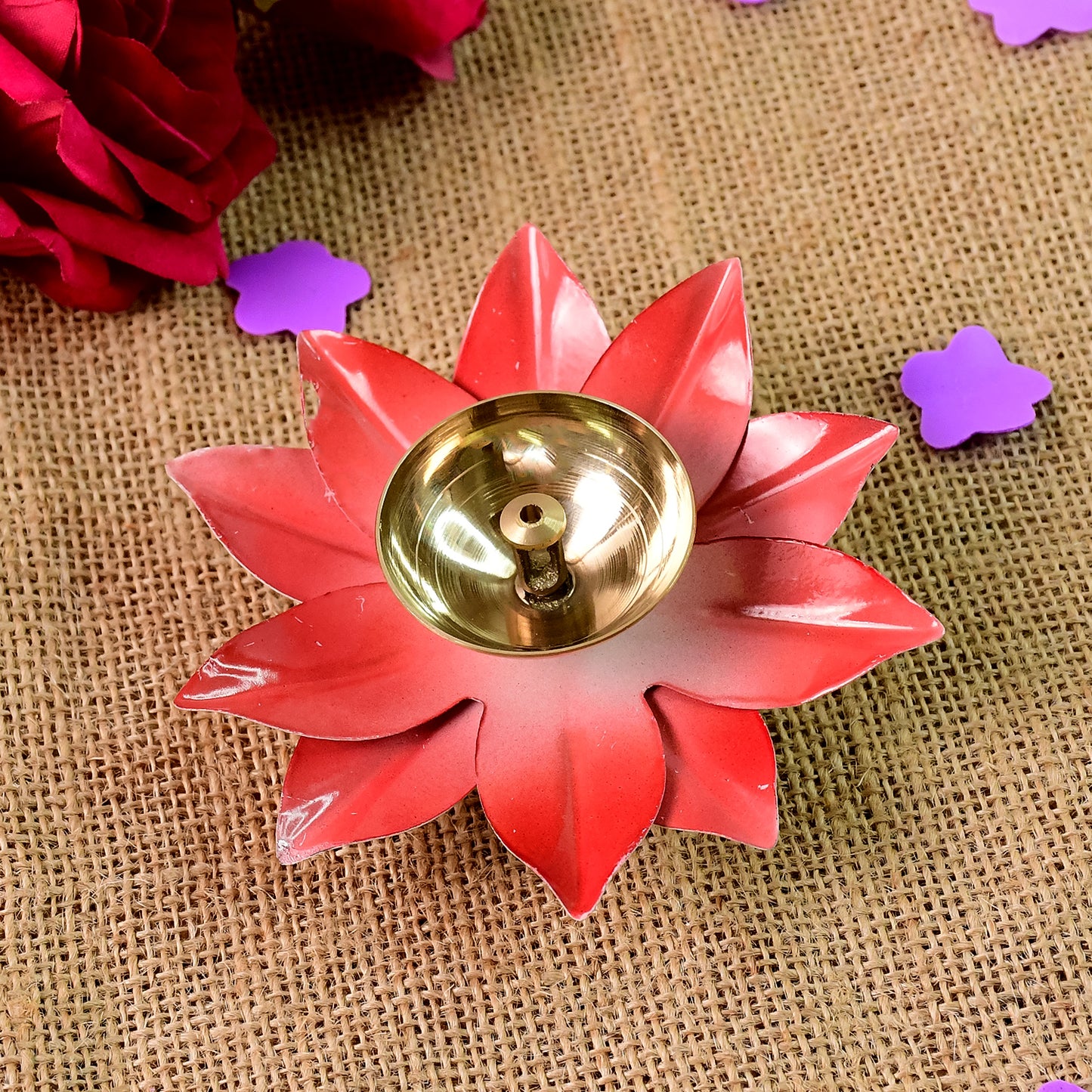 Brass lotus-shaped oil diya for home decor, featuring intricate design and a small bowl for oil and wick, by Wukusy.