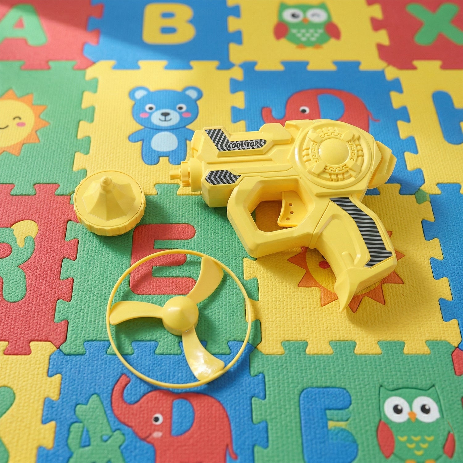 Wukusy Rapid Rotor Flying Launcher Toy Gun Set with colorful rotor discs and launcher for outdoor fun and target practice.
