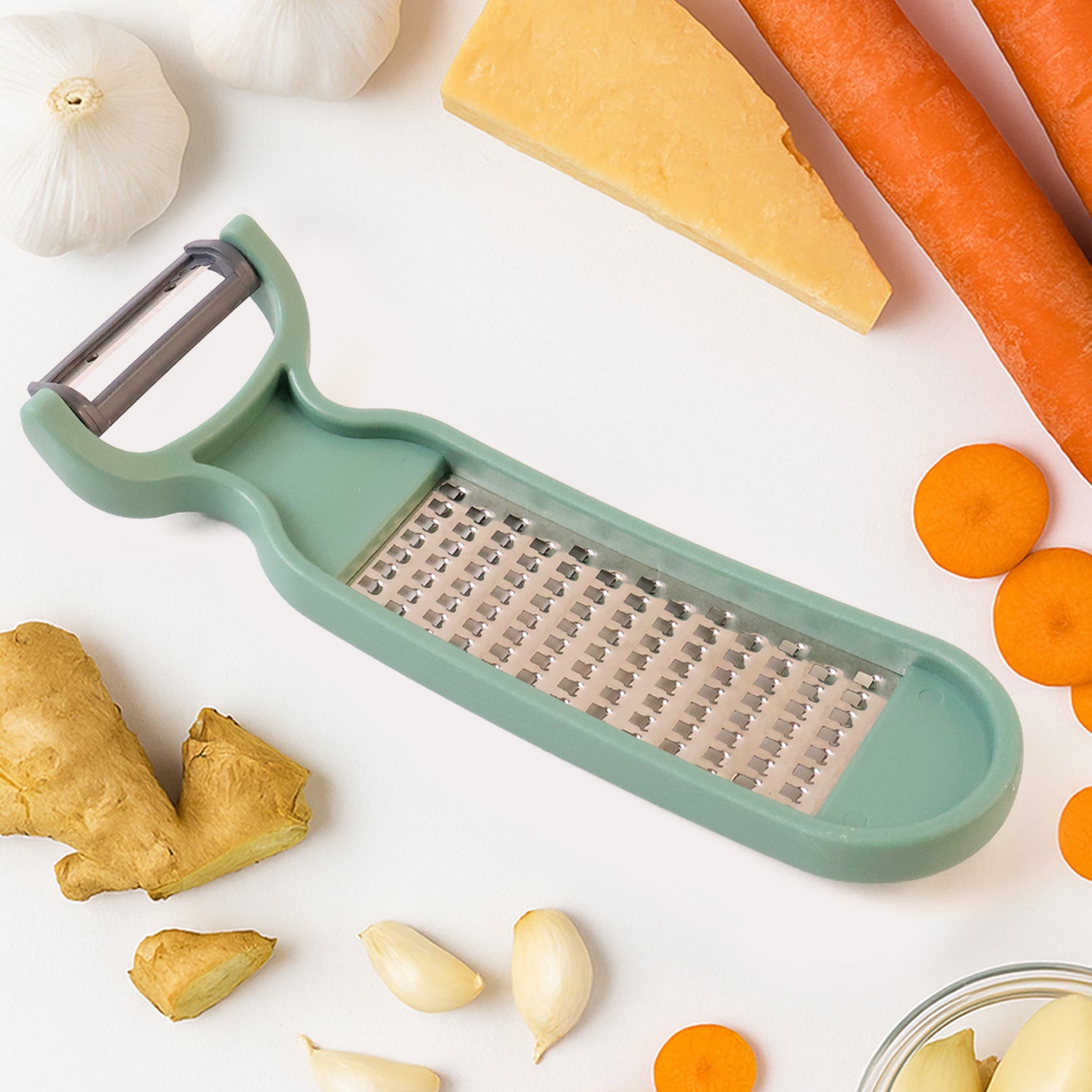 Wukusy Apex 2-in-1 vegetable grater and peeler combo tool for kitchen prep, with stainless steel blades and ergonomic handle.