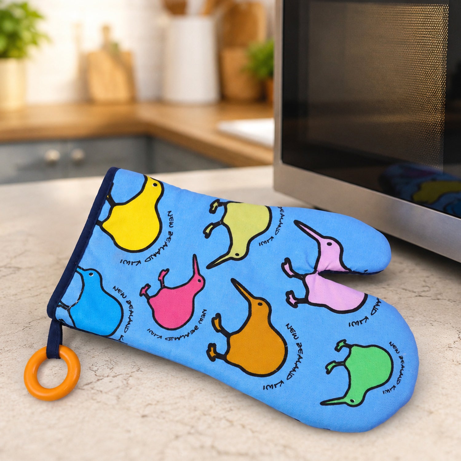 Wukusy heat resistant oven hand glove for baking, cooking, and pot handling, shown in a close-up image with textured fabric design.