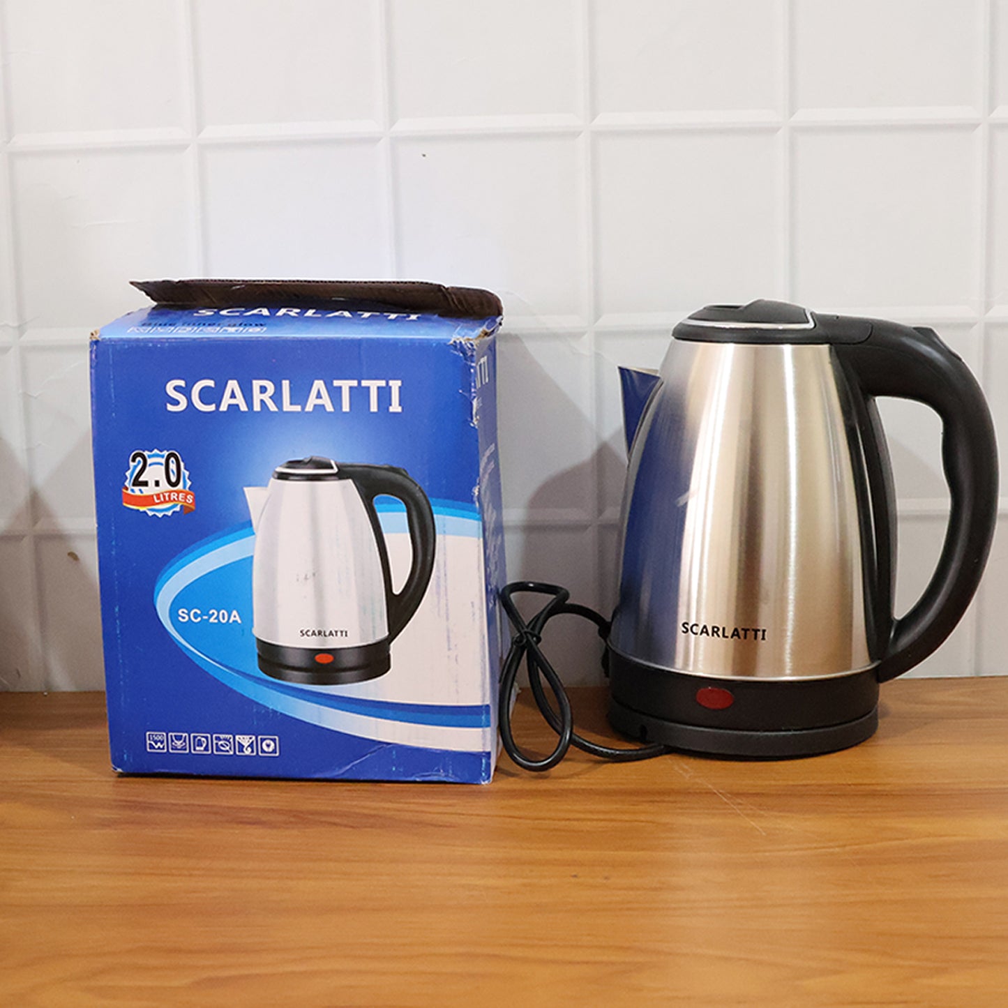 Wukusy Scarlatti stainless steel electric kettle with 2-liter capacity, featuring a sleek modern design and a convenient spout.