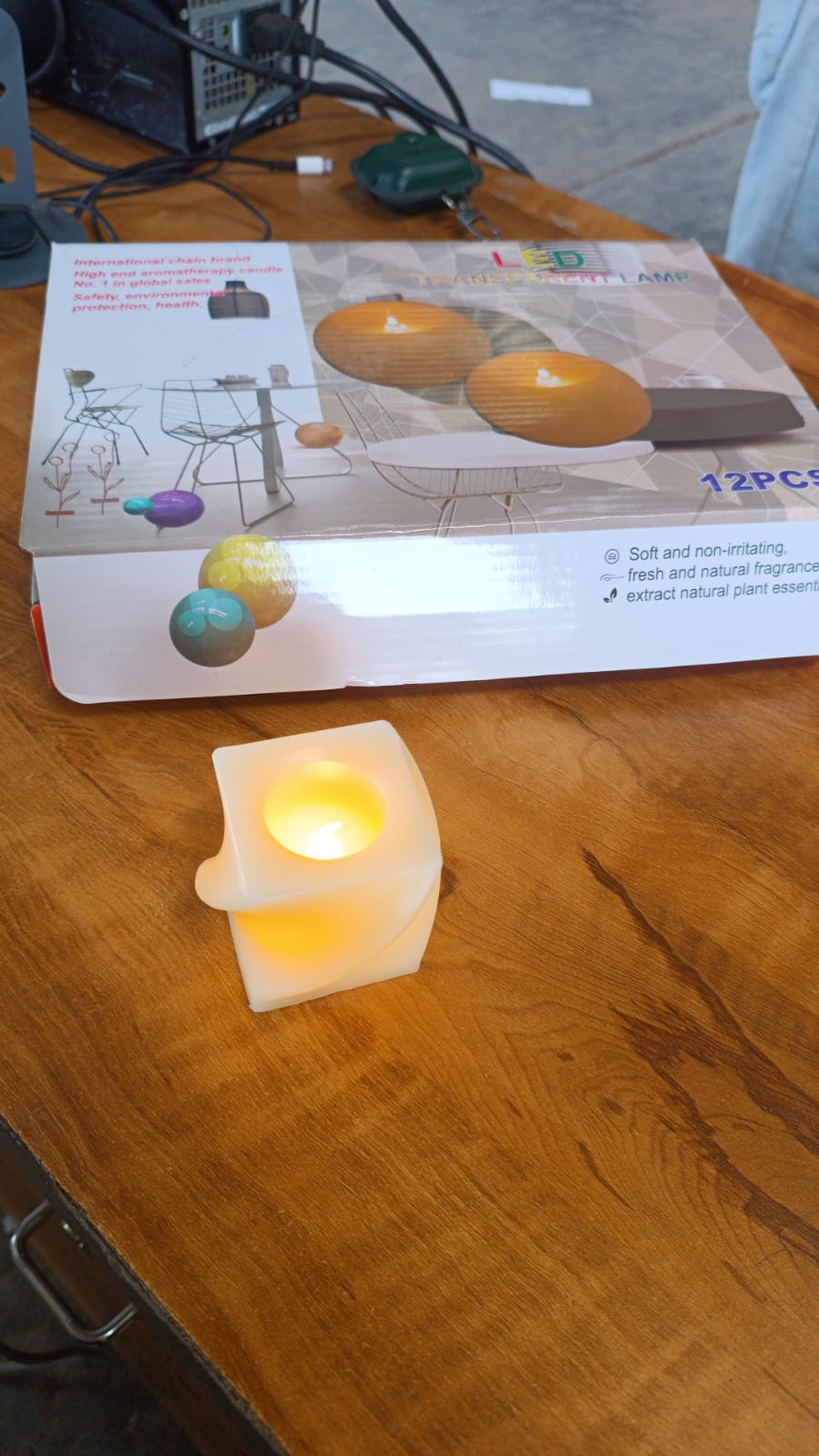 Set of 12 Wukusy LED flameless decorative square tealight candles for home decor, shown in a modern arrangement.