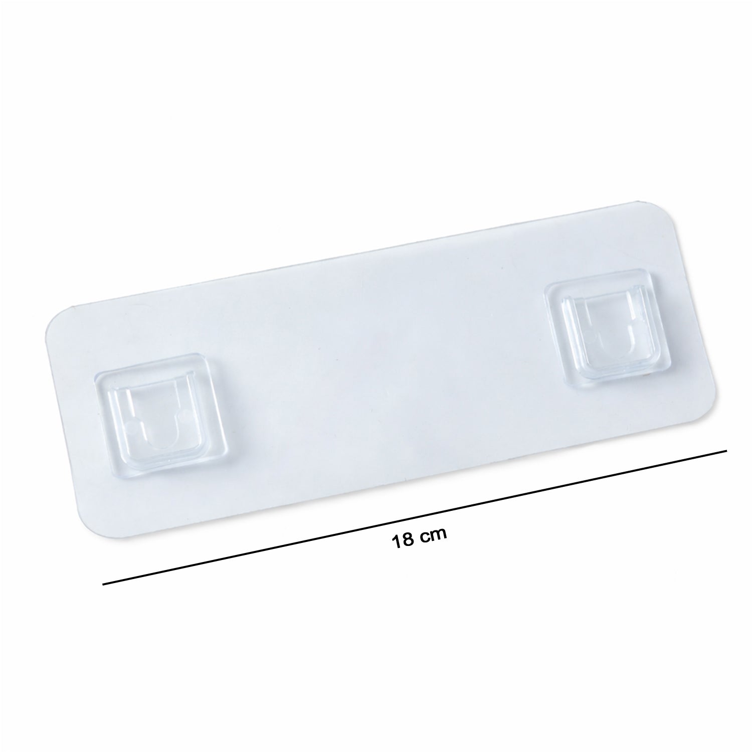 Wall-mounted Wukusy self-adhesive hanger attached to a wall, suitable for organizing and hanging items efficiently.