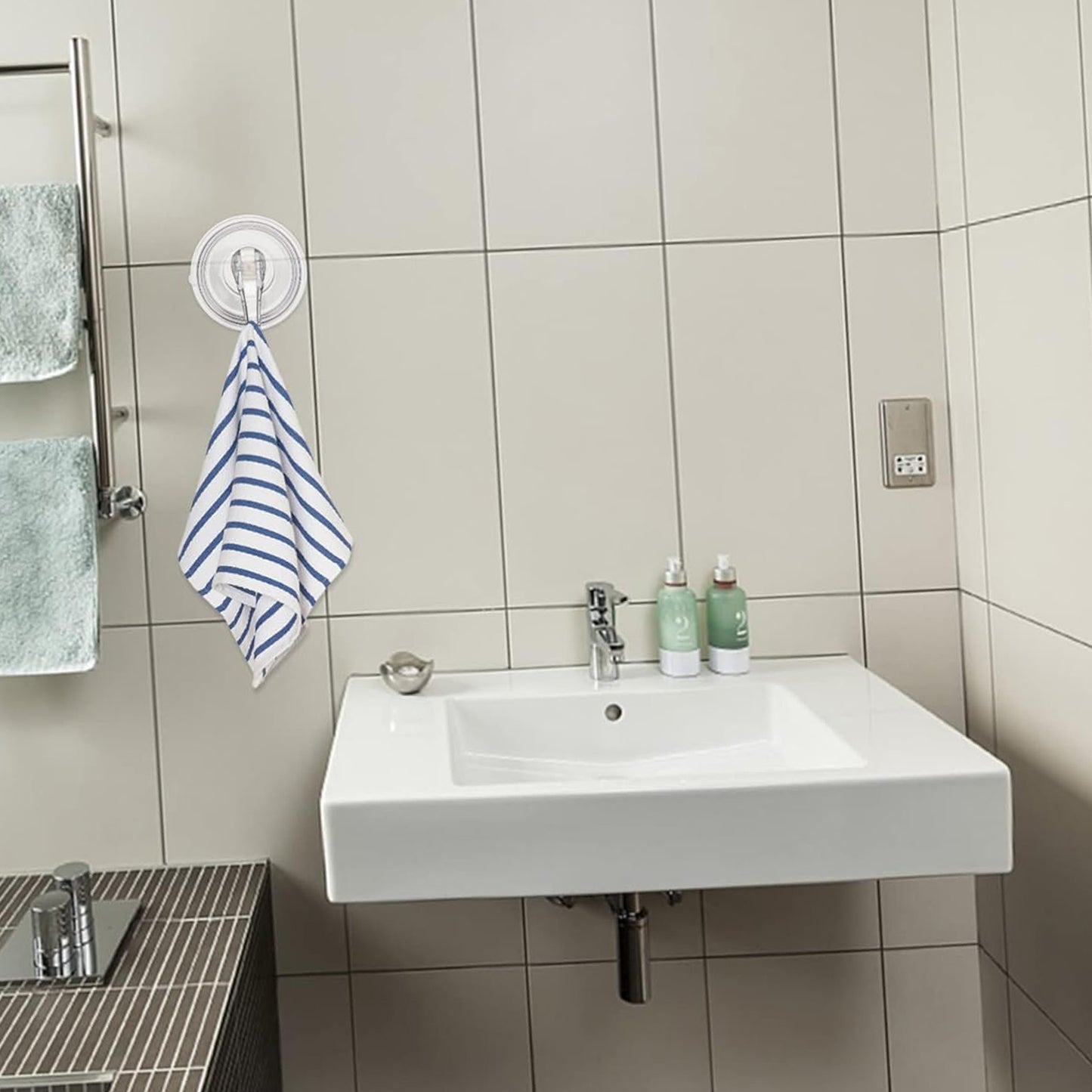 Plastic suction cup hook by Wukusy, versatile home and kitchen accessory for hanging lightweight items on smooth surfaces.