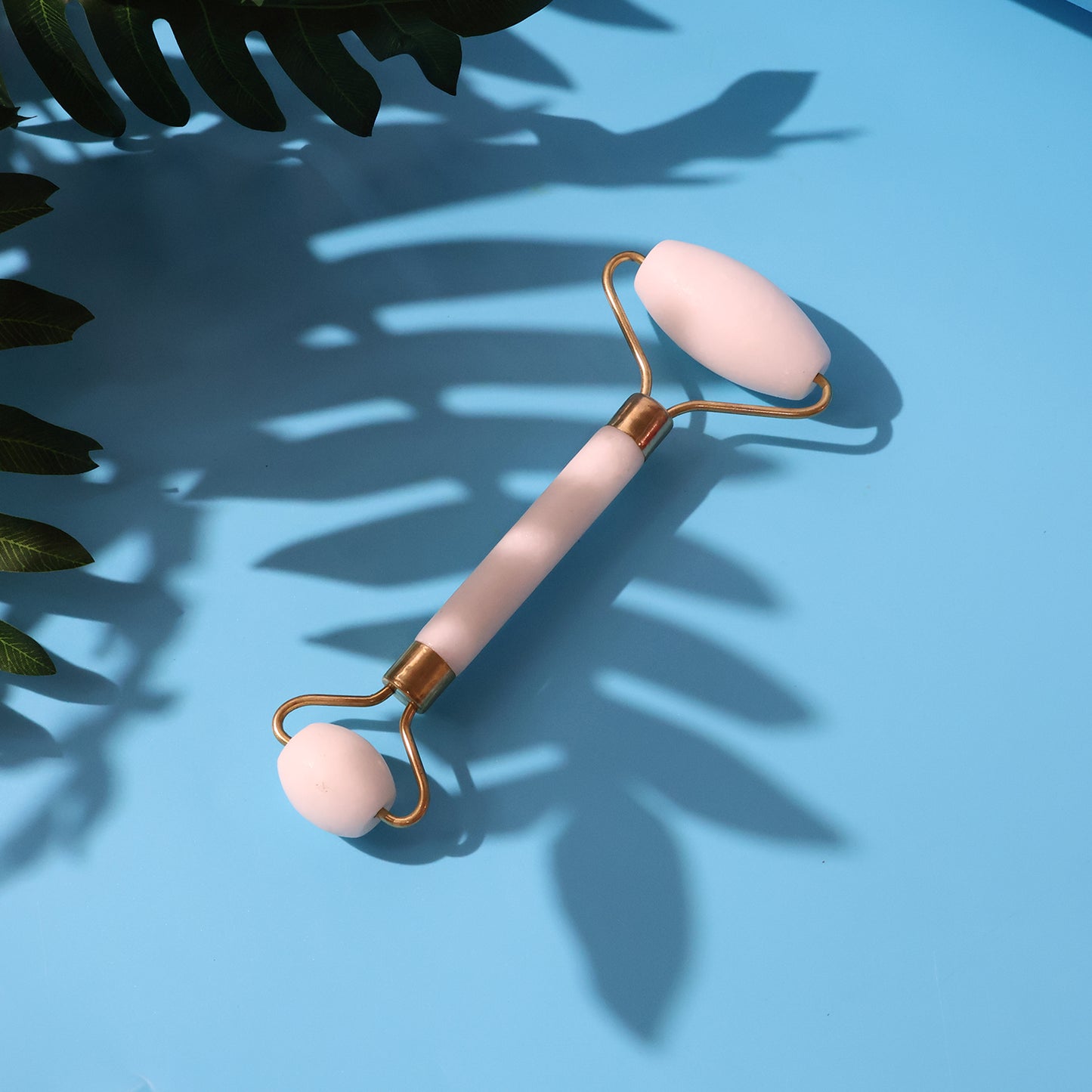 Wukusy dual-ended face massage roller with textured and smooth sides for facial skin tightening and relaxation.