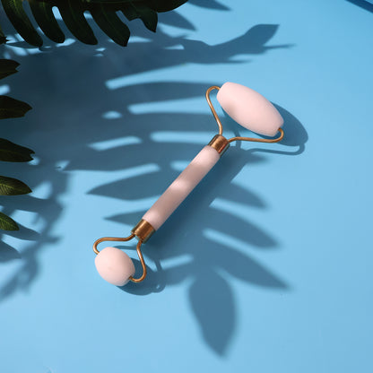 Wukusy dual-ended face massage roller with textured and smooth sides for facial skin tightening and relaxation.